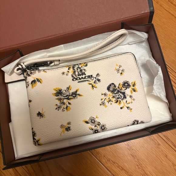Coach Handbags - Coach Floral Pebble Leather Wristlet in Cream with Yellow & Gray Blooms